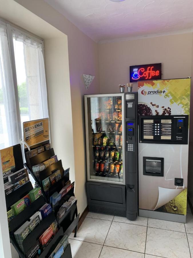 Hotel Le P'Tit Monde Монтиньяк Экстерьер фото