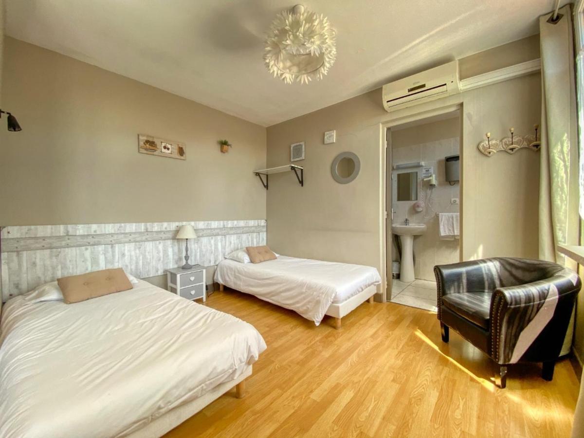 Hotel Le P'Tit Monde Монтиньяк Экстерьер фото