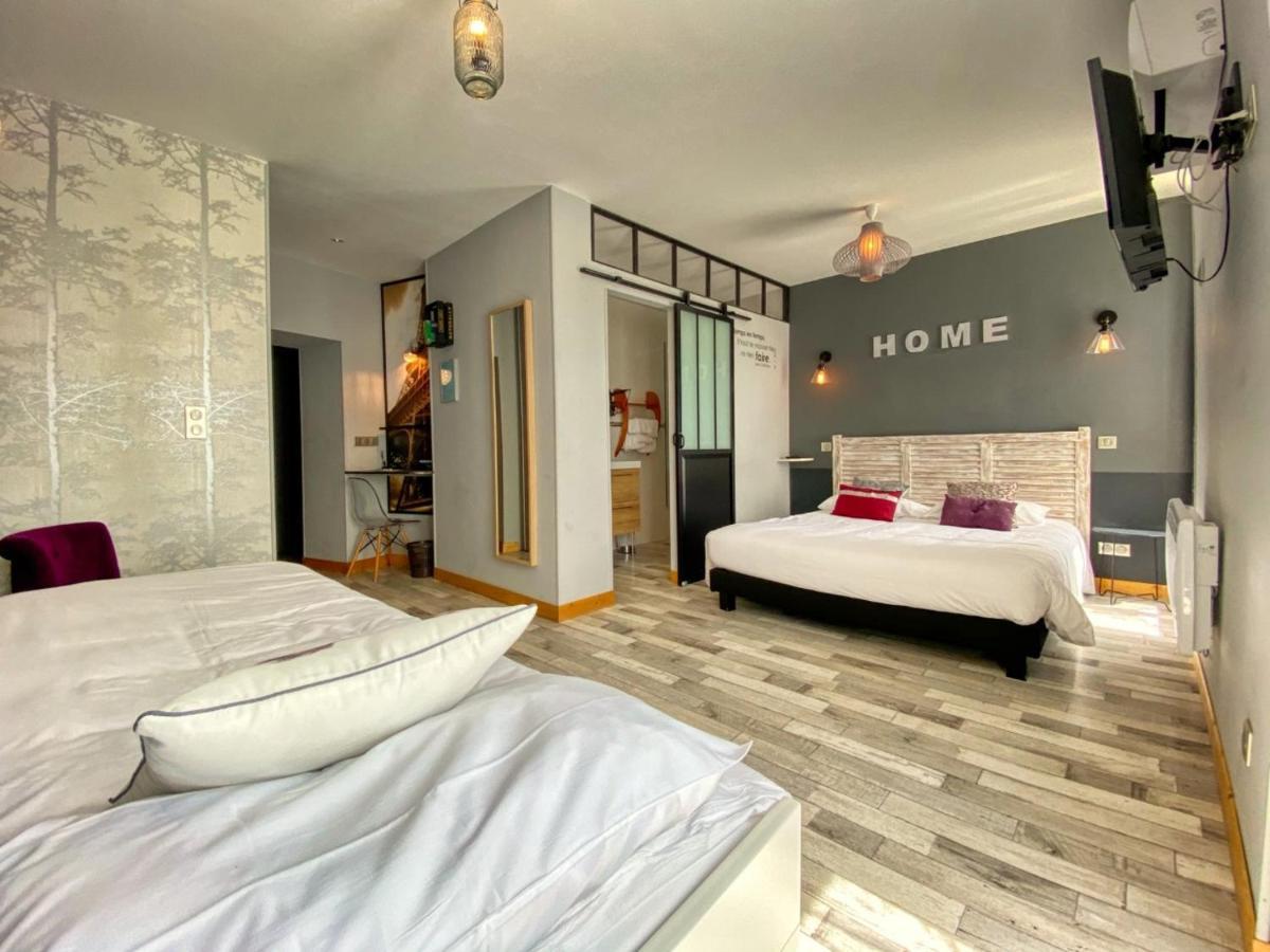 Hotel Le P'Tit Monde Монтиньяк Экстерьер фото